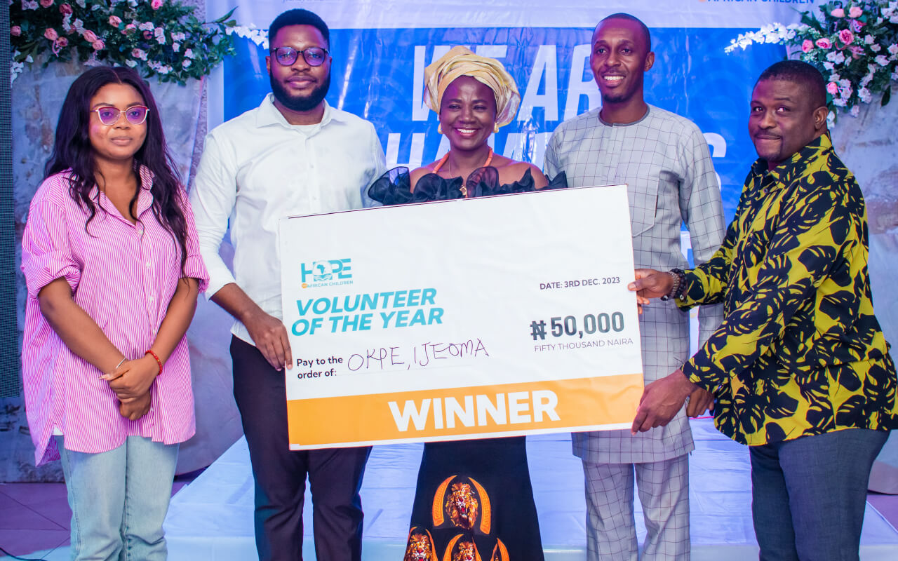 HOPE-Volunteer-being-awarded-at-end-of-year-party-1